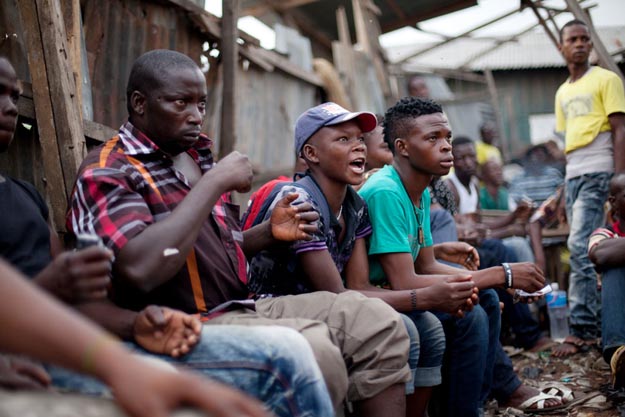 Lagos, Nigeria- Fans look on during a Dambe match in Lagos, Nige